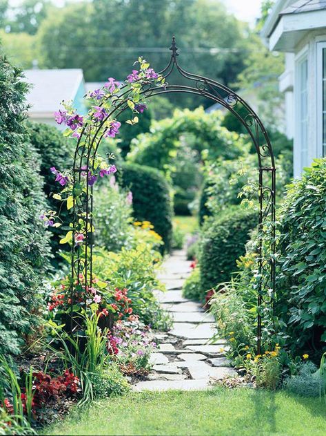 Garden Inspiration: Arbors, Trellises & Gates - The Inspired Room Metal Arbor, Back Yards, Garden Arbor, Garden Entrance, Stone Path, Garden Gate, Side Yard, Plants And Flowers, House Landscape