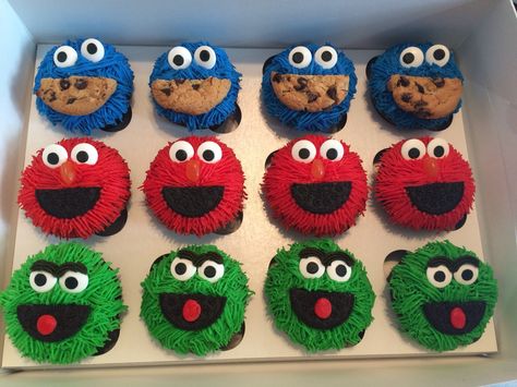 Easy Sesame Street Cupcakes, Elmo Cupcakes Girly, Sesame St Cupcakes, Sesame Street Cupcakes Diy, Sesame Street Birthday Cupcakes, Sesame Street Pull Apart Cupcake Cake, Sesame Street Desserts, Sesame Street Cakes, Sesame Street Cake Ideas