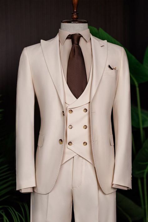 Illuminate your wardrobe with the Beige Modern-Fit Suit 3-Piece, designed to capture the essence of sunlit sophistication. The suit’s tailored modern fit and light beige hue create a look that radiates contemporary elegance. Perfect for daytime events or garden weddings, this suit ensures you shine with refined confidence and effortless style.

#singlebreasted #beigesuit #tuxedo #suit #suits #slimfit #menstyle #menfashion #fashioninspo 3 Piece Suit Men Classy, 3 Piece Suit Men, Blazer Waistcoat, Bow Tie Suit, Modern Fit Suit, Suit Styles, Suit Stores, Slim Fit Suit Men, Beige Suits