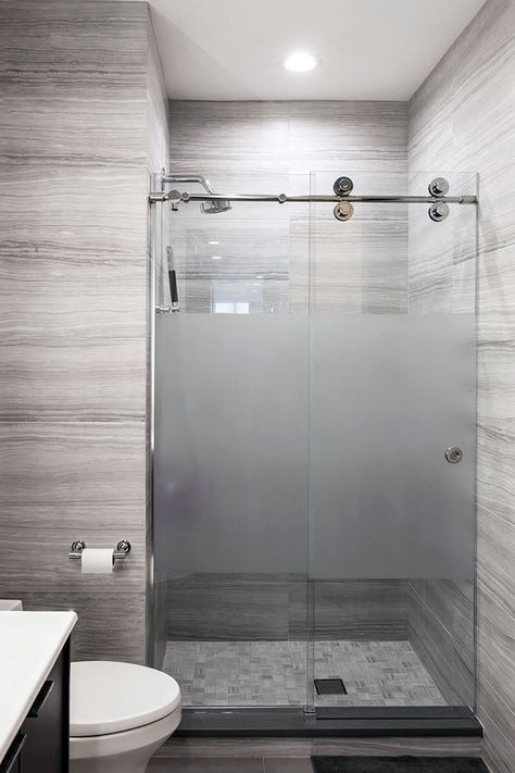 Gray Porcelain Tile Bathroom and Shower with frosted sliding glass doors and modern hardware. Frosted Glass Shower Door, Modern Shower Doors, Modern Shower Design, Grey Bathrooms Designs, Shower Sliding Glass Door, Tub To Shower Conversion, Bathroom Shower Doors, Shower Conversion, Frameless Shower Doors