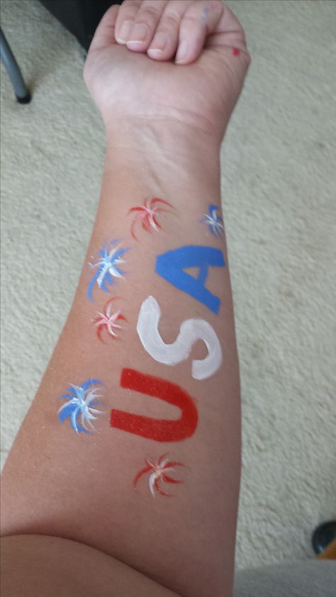 USA with Fireworks Red White And Blue Body Painting, Leg Painting Body Art 4th Of July, Usa Face Paint Ideas, 4th Of July Leg Paint, Usa Face Paint, Fourth Of July Face Paint, 4th Of July Face Paint, Football Face Paint, July Face Paint