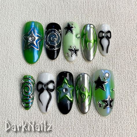 Custom Green Press On Nails, Gothic Punk Rock Nails, Goth Y2K Ribbons Black Stars Press On Nails bring a touch of nostalgia and futuristic style to your fingertips. With a wide range of colors, designs, and finishes, these press on nails allow you to express your individuality and stay on top of the latest trends. Whether you prefer bold and vibrant shades or subtle and sophisticated designs, DarkNailz press on nails offer endless possibilities for creating your desired look. [PLEASE READ BEFORE Gel X Nail Designs Green, Green Day Nails, Green And Black Nail Ideas, Cute Dark Green Nails, Nails Inspiration Green, Green Punk Aesthetic, Vkei Nails, Black And Green Nails Designs, Green And Black Outfits