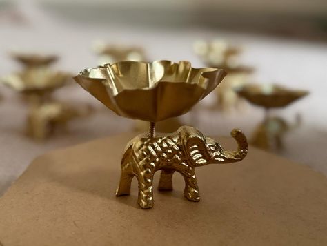 Stand out from the crowd with the exquisite Elephant Tea Light Holder - a thoughtful and elegant gift that your guests will treasure forever! 🔔 DM for details Jeronimus Bosch, Diy Party Animals, Plastic Candle Holders, Birthday Candle Holder, Animal Candles, Gold Animals, Diy Candle Holders, Gold Spray Paint, Gold Diy