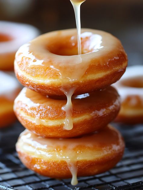 Homemade Krispy Kreme-Style Doughnuts 🍩  🍩 𝗜𝗻𝗴𝗿𝗲𝗱𝗶𝗲𝗻𝘁𝘀 🍩 For the Doughnuts: 2 1/4 teaspoons active dry yeast (1 packet) 1/4 cup warm water (110°F) 1 1/2 cups lukewarm milk 1/2 cup granulated sugar 1 teaspoon salt 2 eggs 1/3 cup unsalted butter, melted 5 cups all-purpose flour, more as needed Vegetable oil, for frying For the Glaze: 1/2 cup milk 2 teaspoons vanilla extract 4 cups powdered sugar Fried Doughnut Recipe, Krispy Kreme Doughnut, Sugar Glaze, Krispy Kreme, Donut Glaze, Doughnut Recipe, Granulated Sugar, Powdered Sugar, Dry Yeast