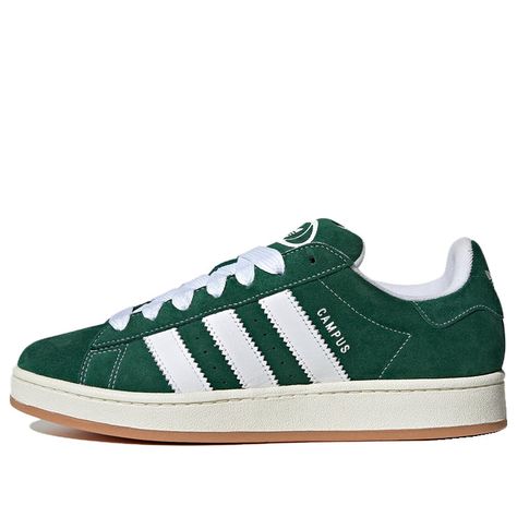 The Adidas Originals Campus 00S 'Dark Green Gum' is an iconic silhouette with a stylish and modern design. The upper is crafted with a durable material, while the sole is made with a comfortable and long-lasting material. This sneaker is perfect for everyday activities and work, providing you with a comfortable experience. Inspired by the classic Campus series, this sneaker is a perfect addition to any sneaker collection. The dark green and white colorway gives the sneaker a classic and timeless Green Shoes Women, Campus Adidas, Jordan Vi, Air Jordan Vi, Adidas Campus 00s, Green Adidas, Style Sportif, Adidas Trefoil, Adidas Campus