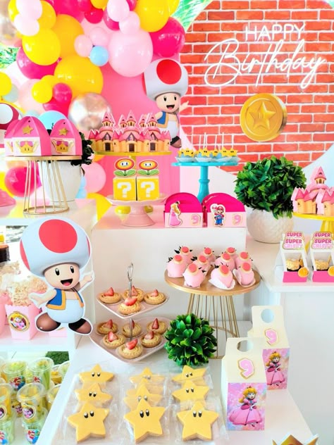 Princess Peach Pool Party, Peaches Birthday Theme Mario, Girly Super Mario Party, Princess Peach Candy Table, Peaches Party Theme Mario, Princess Peach Centerpiece Ideas, Princess Peach Dessert Table, Girly Mario Birthday, Princess Peach Birthday Ideas