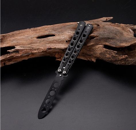 Learn the art of butterfly knife tricks safely with the ATWG Butterfly Knife. Designed for beginners, it features a blunt blade for practicing flipping tricks. It comes with a storage bag and toolkits, making it the ideal training tool. Level up your skills and impress with your flips! 🪚💫 #BalisongKnife #TrainingTool #SkillDevelopment Butterfly Knives, Knife Skill, Butterfly Knife, Training Tools, Folding Knives, Bushcraft, Storage Bag, Metal Working, Bag Storage