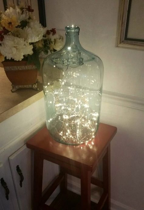 Upcycling an Old Glass Water Bottle - DIY Inspired Big Glass Jug Decor Ideas, Five Gallon Water Jug Ideas, Carboy Ideas, Big Glass Jar Ideas, Glass Jugs Decor Ideas, Glass Jugs Crafts, Glass Jugs Decor, Jug Decor, Large Glass Bottle