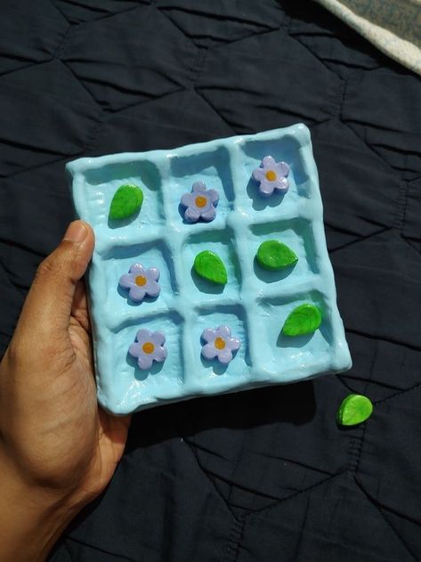 Air Dry Clay Coasters: Creative Ideas and Tips for Perfect Results Oven Bake Clay Art, Tictactoe Board Clay, Ceramic Tik Tak Toe, Clay Ideas Tic Tac Toe, Clay Tictactoe, Tiktaktoe Clay, Tick Tack Toe Diy Clay, Air Dry Clay Tic Tac Toe Board, Oven Dry Clay Projects