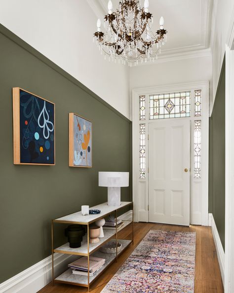 Deeper greens like Dulux Mangrove can be used to easily create a statement design feature. Purchase a swatch or sample from the Dulux Colour Shop to see the colour come to life in your home.    Stylist: Julia Green Stylist  Photographer: Armelle Habib Photography Dulux Hallway, Hallway Wall Colors, Green Hallway Ideas, Hallway Paint, Hall Colour, Hallway Colours, Green Hallway, Hallway Designs, Green Walls