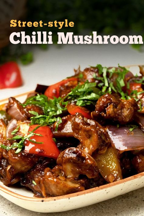 Street style Chilli Mushroom is a spicy and delicious #ChineseStarter. This #ChilliMushroom is made using mushroom, soy sauce, tomato ketchup, and bell peppers. You can now make this #StreetstyleChilliMushroom with Cookd’s simple recipe and serve it hot. Do try this recipe and share your feedback with us. Chili Mushroom Recipe, Mushroom Capsicum Recipe, Mushroom Chilli Recipe, Chilli Mushroom Recipe, Spicy Mushrooms, Chilli Mushroom, Chinese Starters, Food Core, Mushroom Chili