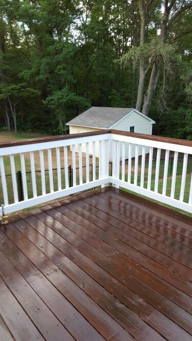 Deck Stain Colors With Yellow House, Front Porch Deck Stain Ideas, Two Tone Wood Deck, Deck Railing Colors Ideas Paint, Gray House Brown Deck, Painted Decks Colors Ideas, Deck Colors Ideas Paint, Refinishing Deck, Deck Painting Ideas