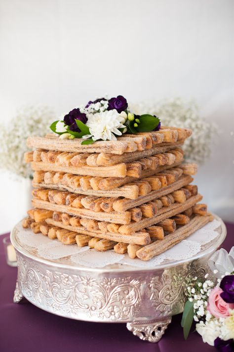 A Churro Cake is a delicious alterntative to the traditional cake. It can still be decorated with flowers and placed on a cake stand to give it a chic wedding look! Churro Cake, Latin Desserts, Alternative Wedding Cakes, Cakes To Make, Wedding Cake Alternatives, Waffle Cake, Traditional Wedding Cake, Naked Cakes, Water Wedding