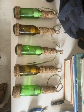 Glass Upcycle, Boho Lights, Beer Bottle Diy, Recycled Beer Bottles, Beer Bottle Crafts, Wine Bottle Project, Bottle Chandelier, Bottom Of The Bottle, Alcohol Bottles