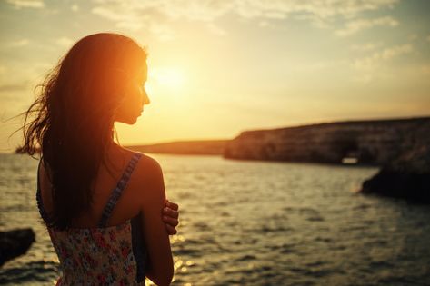 Beautiful woman looking into the distanc... | Premium Photo #Freepik #photo #winter #people #travel #summer Hiking Poses, Looking Into The Distance, Sunset Images, Yellow Sky, Looking Out The Window, National Dress, Curly Girl Hairstyles, Woman Looking, Enjoy Summer