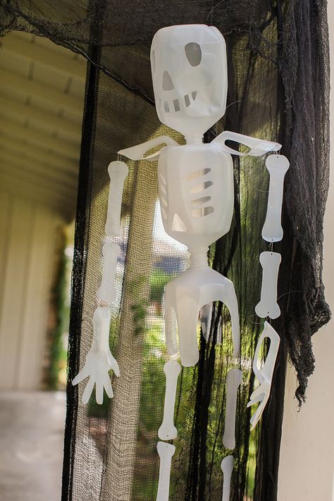 Milk Jug Skeletons | Easy DIY Halloween Decoration | DIY Skeleton Decor Milk Jug Halloween, Skeleton Dog Decoration, Halloween Milk Jugs, Halloween Mural, Diy Halloween Skeleton, Halloween Decoration Diy, Skeleton Halloween Decor, Diy Skeleton, Diy Projects For Adults