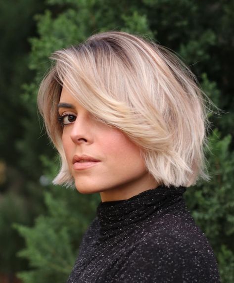 Flip Haircuts Over 50, Short Bob With Flipped Ends, Flick Out Bob Hairstyles, Short Layered Bob With Wispy Bangs, Below Chin Bob Haircuts, Bob Growing Out Bangs, Very Short Bob With Bangs For Fine Hair, Side Bangs Bob Haircut, Short Round Bob Haircut