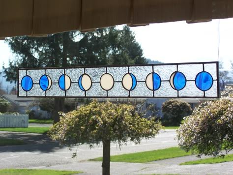 Moon Phases Stained glass window panel. porterstreetstudios.com Moon Phase Stained Glass Pattern, Moon Phases Stained Glass Art, Stained Glass Constellation, Stained Glass Moon Phases, Stained Glass Moon Patterns, Stained Glass Witchy, Stained Glass Hanging In Window, Witchy Stained Glass Patterns, Moon Stained Glass Art