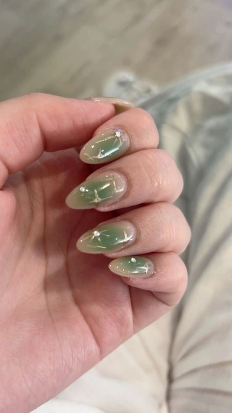 Green Nails Gel Polish, Green Nails Inspo Almond, Sage Green Korean Nails, Fairy Aesthetic Nails Green, Green Star Nails Acrylic, Fairy Grunge Nail Ideas, Sparkle Nails Green, Sage Jelly Nails, Emerald Green Nails With Gold Accent