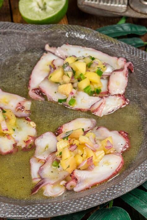 This octopus appetizer will transport your taste buds right to the Caribbean Islands.  A lovely dish you will make again and again. #octopusrecipe #caribbeanfood #octopuscarpaccio #appetizer #internationalcuisine #worldfood Octopus Carpaccio Recipe, Yellowtail Carpaccio, Octopus Appetizer, Caribbean Octopus, Octopus Ceviche, Octopus Carpaccio, Octopus Recipes, Octopus Salad, Carribean Food