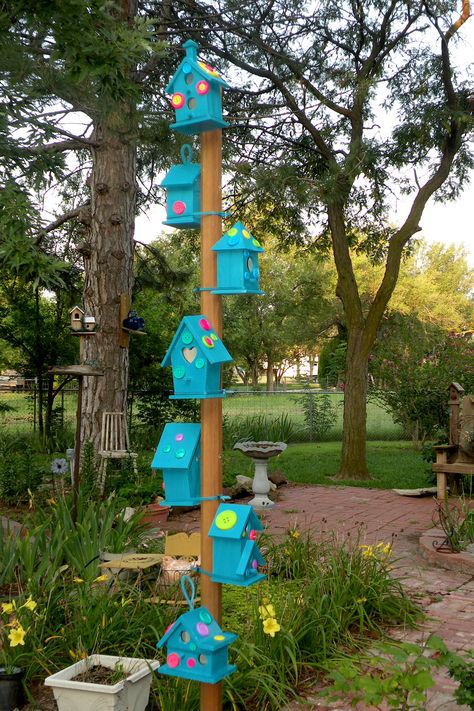 My new birdhouse pole!  Welcome little feathered friends :) Birdhouse Stand, Bird House On Fence, Birdhouses On Fence Ideas, Multiple Birdhouses On A Post, Bird Houses Flower Holders, Birdhouse On A Pole, Birdhouse Pole, Homemade Bird Houses, Bird Houses Ideas Diy