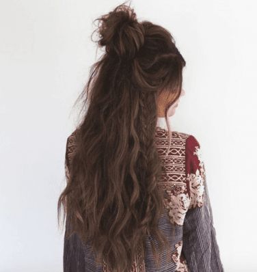 35 Best Half-Up Bun Hairstyles That Don't Look Messy | YourTango Long Hair Half Up Half Down Bun, Fairy Bun Hairstyles, Long Wavy Hair Half Up Half Down, Half Up Half Down Brown Hair, Punchy Hair, Messy Half Bun, Messy Half Up Half Down, Nightclub Hairstyles, Western Hairstyles