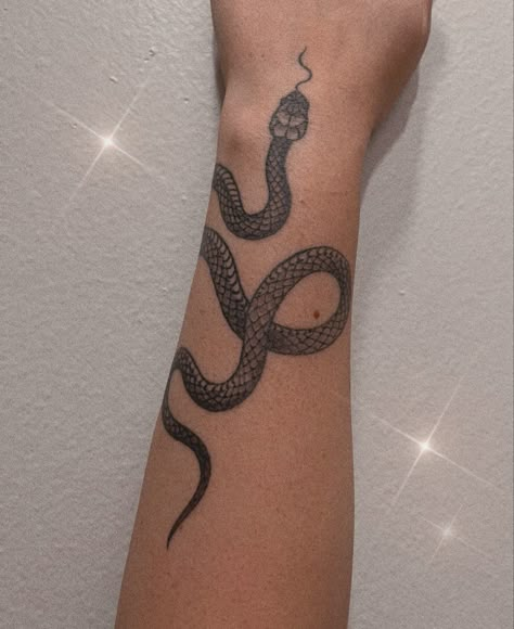 Black & white snake tattoo on forearm. Snake Going Up Arm Tattoo, Arm Tattoos For Women Inner Forearm, Inner Arm Snake Tattoo, Snake Tattoo Patchwork, Snake Tattoo Old School Black, Snake On Forearm Tattoo, Forearm Snake Tattoo Women, Wrap Around Snake Tattoo Arm, Snake Tattoo Wrist