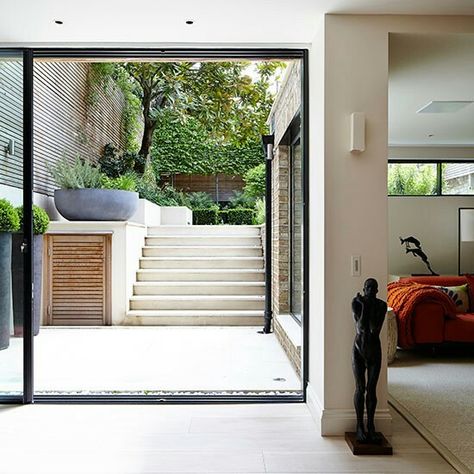 Terraced sunken garden/basement "egress"