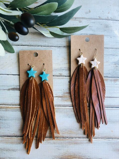 Whiskey brown fringe feather leather star earring/fringe leather earring/long star fringe earring/long feather earring/turquoise white star Whiskey brown star fring-y feather leather earring with ,gold hooks.So fun and boho -licious! Light weight and comfy. Earring hooks are lead and nickel free. Make sure to choose star color choice:)turquoise blue or white turquoise :) Earrings are ready to sell and will ship out same or next day. Earrings come in a gift box ready for gifting with tracking .th Handmade Leather Earrings, Western Faux Leather Earrings, Leather Feather Earrings, Painted Leather Earrings, Leather Fringe Earrings, Western Leather Earrings, Leather Earrings Diy, Leather Earrings Ideas, Diy Leather Feather Earrings