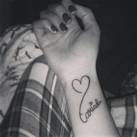 Wrist tattoo. 'Cariad' - Welsh for 'love'. #tattoos #letteringtattoo #heart I looooooooooove this Cariad Tattoo, Welsh Tattoos For Women, Welsh Tattoo Ideas, Tattoo On The Side, Welsh Tattoo, Infinity Tattoo On Wrist, Grey Ink Tattoos, Script Tattoos, Symbols Of Strength Tattoos