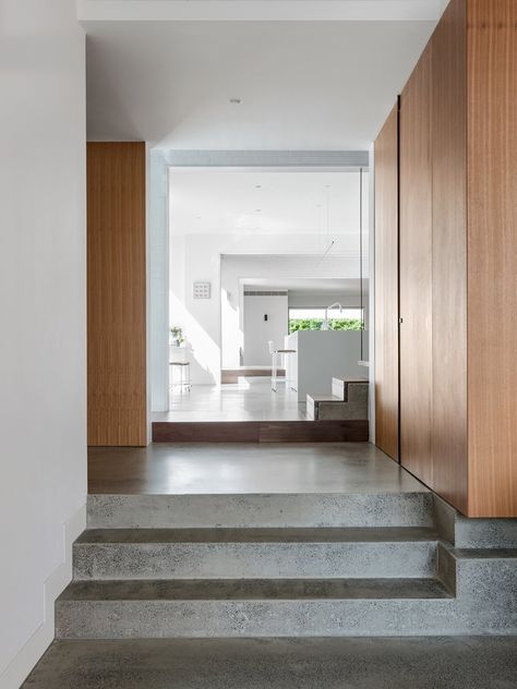 Hallway and Concrete Floor Internal brick walls and polished concrete surfaces provide thermal mass that help keep the interior spaces cool. New Modern House, Passive House Design, Concrete Interiors, Concrete Houses, Passive Design, Dress Models, Concrete Stairs, Concrete House, Concrete Floor