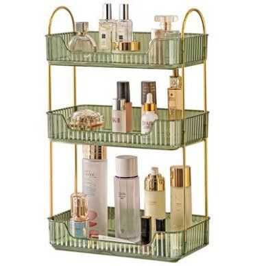 Enhance your bathroom with our elegant ivory white bathroom organizer. Crafted from durable polyethylene terephthalate, it combines luxury style with functionality. Easy to assemble and featuring higher layer spacing, it provides ample storage for cosmetics, toiletries, and more. The perfect gift for any occasion! Finish: Green/Gold | Red Barrel Studio® Elegant Gem Green Bathroom Organizer - Luxury Style, Easy Assembly, Higher Layer Spacing | 7.9 Makeup Room Organization, Bathroom Vanity Organization, Organize Bathroom Countertop, Bathroom Counter Organization, Minimalist Vanity, Perfume Tray, Plastic Organizer, Tray Organization, Vertical Design