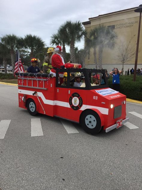 Facilities shows off their firetruck! Golf Cart Fire Truck, Fire Truck Golf Cart, Parade Float Theme, Cardboard Cars, Golf Cart Decorations, Golf Cart Bodies, Homecoming Floats, Fire Gear, Parade Ideas