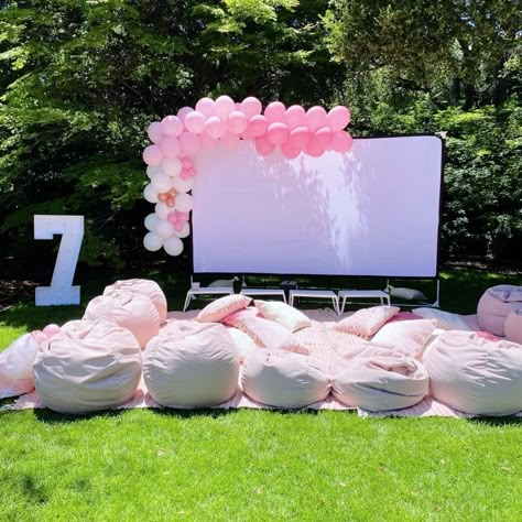 Outdoor Movie Theme Birthday Party, Preppy Movie Night Party, Pink Bonfire Party, Pink Movie Birthday Party, Movie Night In Pool, Pink Movie Night Party, Kids Movie Night Birthday Party, Kids Movie Night Ideas, Pink Movie Night