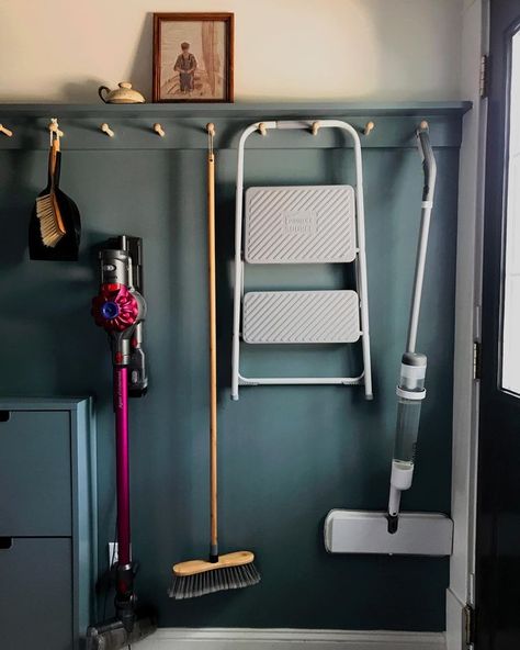 blue laundry room smokey blue shaker peg rail Peg Rail Laundry Room, Laundry Room Peg Rail, Broom Storage In Laundry Room, Shallow Cabinets, Shaker Peg Rail, Broom Storage, Perfect Laundry Room, Coat Pegs, Shaker Pegs