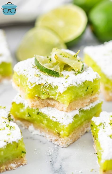 A few Lime Bars in a stack with one missing a bite. Recipes Using Lime Juice, Desserts With Lime, Lime Recipes Healthy, Candied Limes, Key Lime Squares, Lime Bars Recipe, Lime Dessert Recipes, Creamy Lemon Bars, Key Lime Recipes