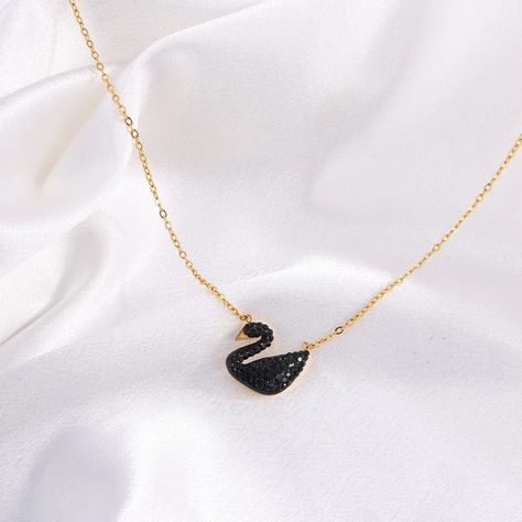 Elegant Black Swan Pendant Necklace - A Symbol of Grace and Beauty 🖤✨ Embrace the elegance of this stunning black swan pendant necklace, crafted to symbolize grace, beauty, and transformation. The delicate gold chain perfectly complements the bold black swan adorned with sparkling crystals, making it the ideal accessory for any occasion. Whether you're dressing up for a night out or adding a touch of sophistication to your everyday look, this piece will surely captivate attention. Shop now a... Swan Pendant, Grace Symbol, Delicate Gold Chain, Grace Beauty, Birthday Items, Chains Necklaces, Necklace Black, Fashion Black, Black Swan