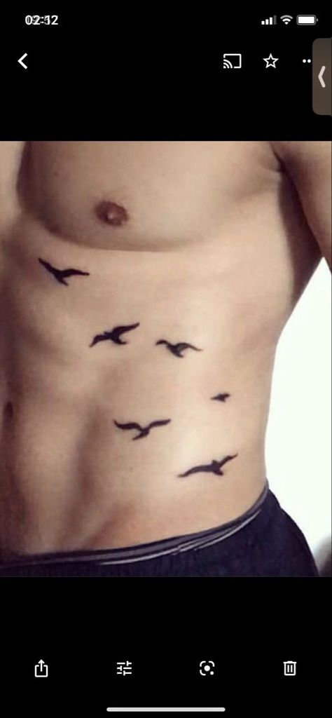 Birds tattoo Birds Flying Tattoo Ribs, Side Body Tattoos Ribs Men, Birds On Ribs Tattoo, Small Bird Tattoo Men, Ab Tattoo Men, Waist Tattoos Men, Crow Tattoo For Men, Chest Tattoo Birds, Tattoos For Guys Shoulder