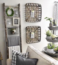 Add decor and hang a wreath on a wooden ladder to add style to your blanket ladder! #farmhousedecor #diyladder #blanketladder #ladderdecor Ladder On Wall Decor, Ladder On Wall, Ladder Decor Ideas, Blanket Ladder Ideas, Blanket Ladder Decor, Tall Wall Decor, Wooden Blanket Ladder, Crazy Weather, Cool Bookshelves