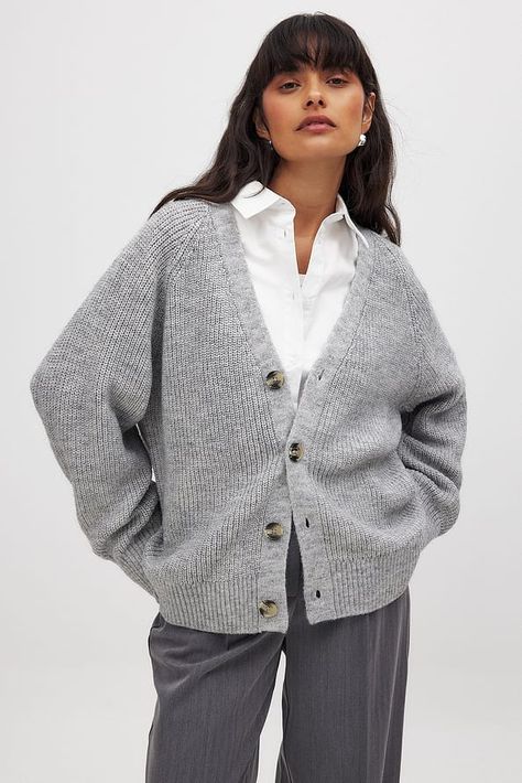 Soft Knit V-neck Cardigan For Daywear, Cozy Gray V-neck Outerwear, Gray Knitted V-neck Outerwear, Cozy V-neck Cardigan For Daywear, Cozy Gray Cardigan For Workwear, Trendy V-neck Cardigan For Daywear, Gray Soft Knit V-neck Sweater, Gray Knit Button-up Outerwear, Oversized Gray Cardigan For Workwear