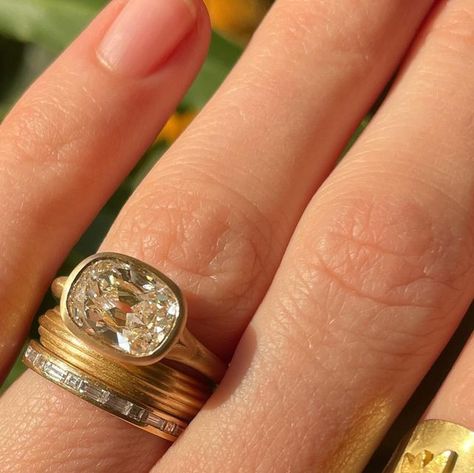 JENNA KATZ on Instagram: "East ↔️ West cushion cut diamond in a custom 18k gold bezel setting. Dream stack. #futureheirlooms #engagementring #finejewelry" Jenna Katz Jewelry, Jenna Katz Ring, East West Cushion Engagement Ring, Bezel Cut Engagement Ring, Cushion Bezel Engagement Ring, East West Engagement Ring Stack, East West Bezel Set Ring, Bezel Engagement Ring Stack, Jenna Katz