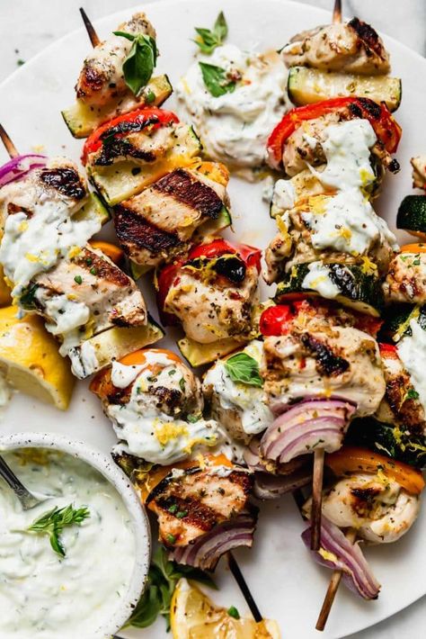 Grilled Chicken Kebabs with Tzatziki Sauce | Marinated in Greek flavors then grilled to perfection, these Greek Chicken Kebabs make for an easy, flavorful and healthy dinner! We like to dip or drizzle the kebabs with Tzatziki Sauce to add even more of an authentic and delicious flavor. A recipe you’ll want to try! || The Real Food Dietitians Authentic Greek Food, Greek Chicken Kebabs, Greek Chicken Kabobs, Weekend Meal Prep, Tzatziki Sauce Recipe, Dorito Casserole, Real Food Dietitians, Greek Foods, Greek Flavors