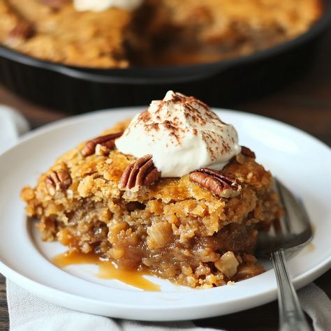 Warm pumpkin pecan cobbler with a gooey center and crisp topping. The perfect fall dessert with rich pumpkin flavor and crunchy pecans. Pumpkin Pecan Crisp, Pumpkin Crisp Recipe, Pecan Cobbler Recipe, Pumpkin Pecan Cobbler, Pineapple Dream Dessert, Crisp Topping, Pumpkin Crisp, Pecan Cobbler, Warm Desserts