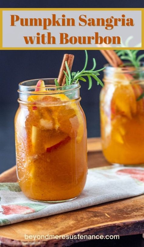 A perfect fall sangria, this Pumpkin Sangria with Bourbon features bourbon-soaked "fruit and booze" (apple and pear), a bottle of chardonnay with toasted vanilla notes, and bright, bubbly ginger beer. You may want to carry this delicious sangria through the holidays and beyond... It's that good! #FallSangriaRecipe #PumpkinSangriaRecipe #SangriawithBourbon #BeyondMereSustenance #FallCocktails #LargeBatchCocktails Chardonnay Cocktail Recipes, Bourbon Sangria Recipes, Pumpkin Spice Sangria, Pumpkin Sangria Recipe, Sangria With Bourbon, Pumpkin Sangria, Autumn Sangria, Fall Sangria Recipes, 55 Birthday