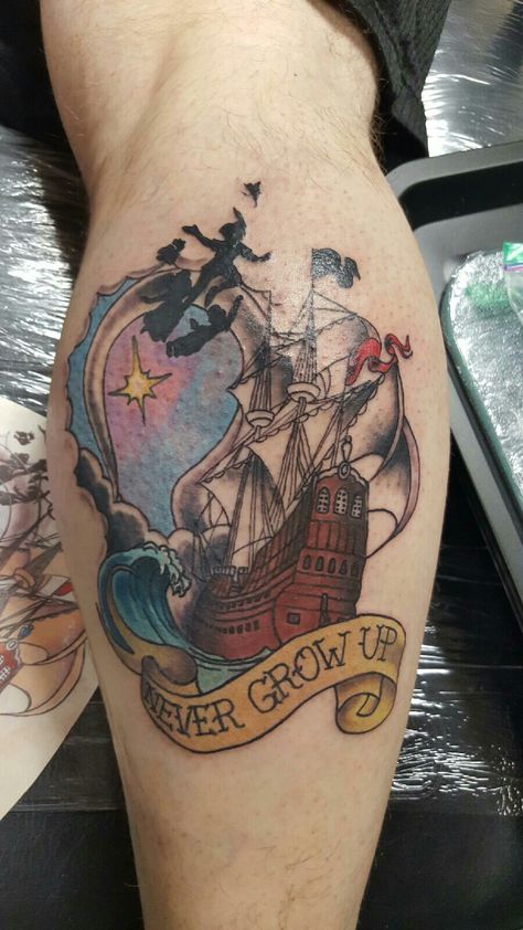 Peter pan never grow up Memorial tattoo Peter Pan Ship Tattoo, Peter Pan Hook Tattoo, Movie Tattoo Sleeve, Peter Pan Tattoo Ideas, Peter Pan Tattoos, Neverland Tattoo, Tattoo Cuff, Hook Movie, Pan Tattoo