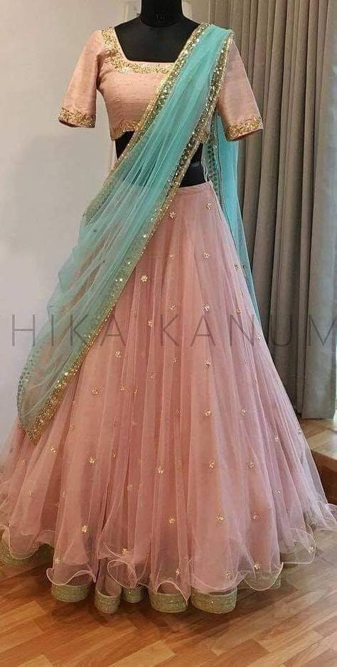 Netted Half Sarees, Peach Lehnga With Contrast Blouse, Light Pink Half Sarees, Half Saree Lehenga Netted, Peach Lehangas, Pink Lehenga Contrast Blouse, Half Saree Stitching Ideas, Netted Lehanga Designs, Net Lehanga Croptop Designs