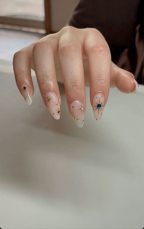 Nails With A Hint Of Gold, Star Oval Nails, Almond Nails With Gold Accent, Square Celestial Nails, Good Star Nails, Gold Nails With Stars, Star Sticker Nails, White Nails With Gold Stars, Gold Star Nail Art