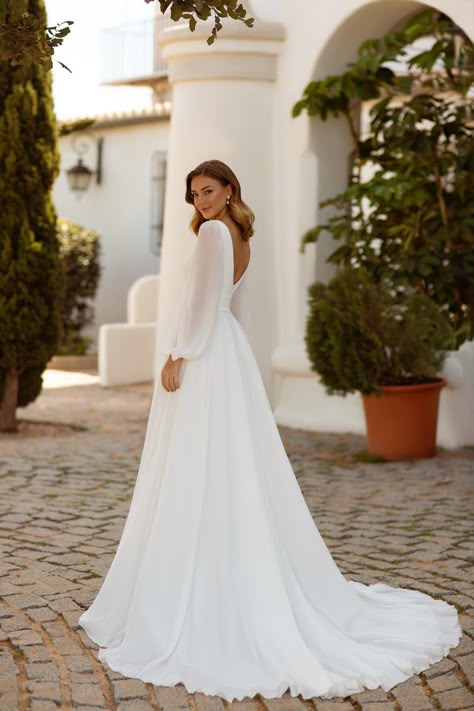 A great A-line #weddingdress with a gathered corset and elegant chiffon long sleeves 🤩 Style 8245 #MonicaLoretti #weddingideas #weddingdress #wedding Wedding Dress Chiffon Sleeves, Wedding Gown Romantic, Modest Long Sleeve Wedding Dresses, Elegant Long Sleeve Wedding Dresses, Modest Wedding Dresses With Sleeves, Chiffon Wedding Gowns, Timeless Wedding Dress, Wedding Dress Flowy, Classy Wedding Dress