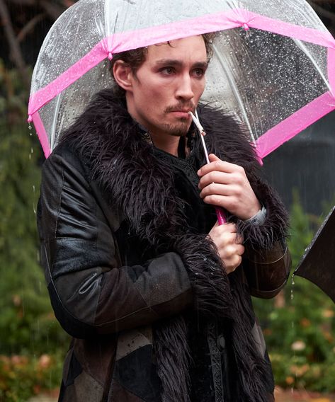 A Very Scientific Explanation For Why You're Hopelessly Obsessed With Umbrella Academy's Klaus+#refinery29 Klaus Hargreeves, Robert Sheehan, Umbrella Academy, In The Rain, The Rain, A Man, Umbrella, Black