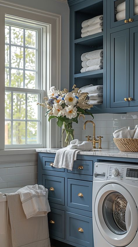 Looking to upgrade your laundry room? 🧺 Explore 40+ of the best laundry room ideas to inspire you! From sleek and modern designs to functional and organized spaces, these ideas will help you create a stylish and efficient laundry area that makes chores a breeze. Whether you have a small nook or a spacious room, find the perfect inspiration to transform your laundry space into something you'll love. #LaundryRoom #HomeOrganization #InteriorDesign #LaundryRoomInspiration #HomeDecor Stylish Laundry Room Ideas, Laundry Room Beach House, Grand Millennial Laundry Room, Laundry Room Ideas Blue, Dark Blue Laundry Room, Blue Laundry Room Cabinets, Laundry Room Layout Floor Plans, Chic Laundry Room Ideas, Best Laundry Room Ideas